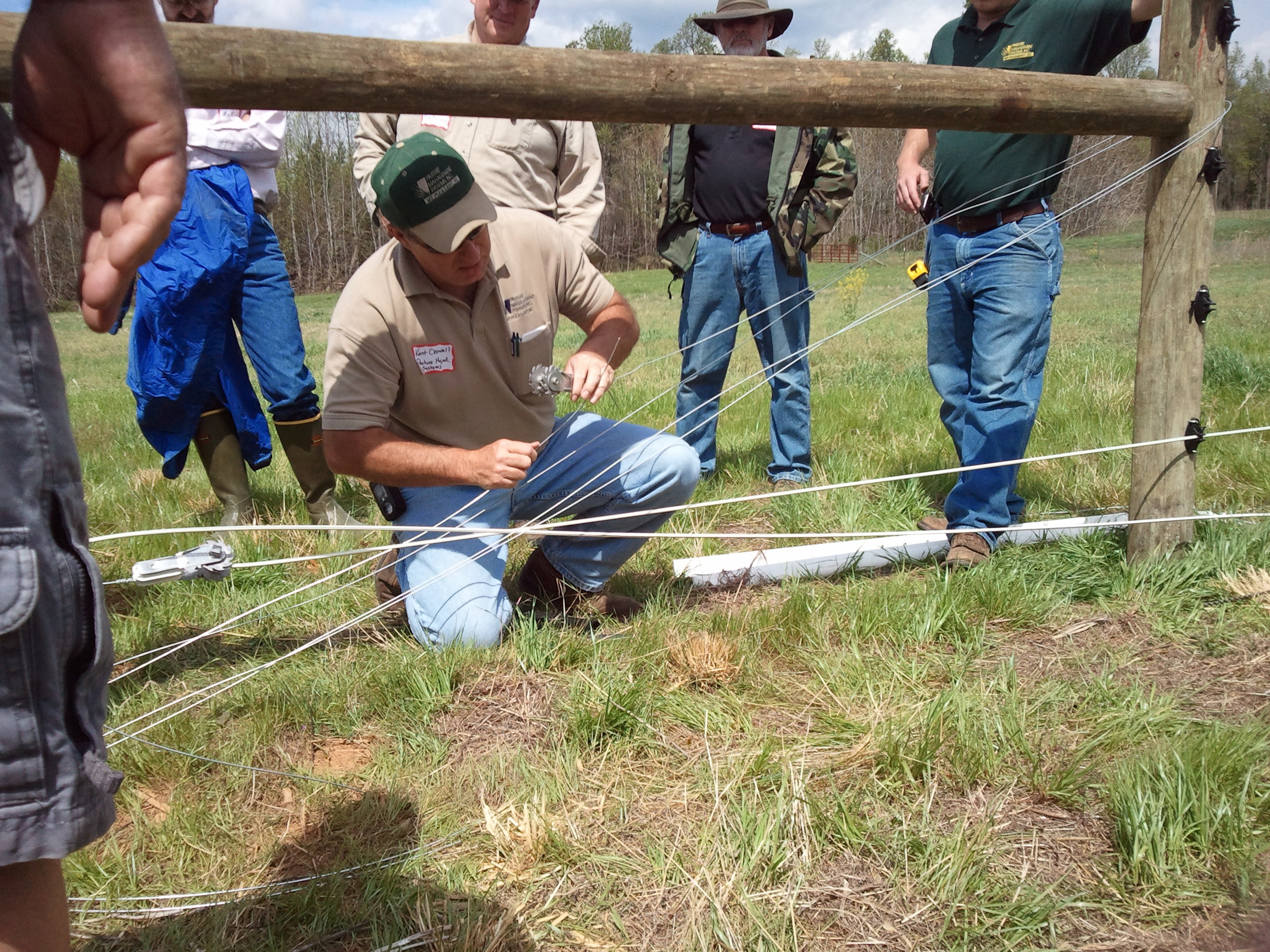 Man showing how to construct brace wire